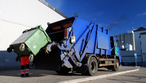 Construction site with builders waste being cleared